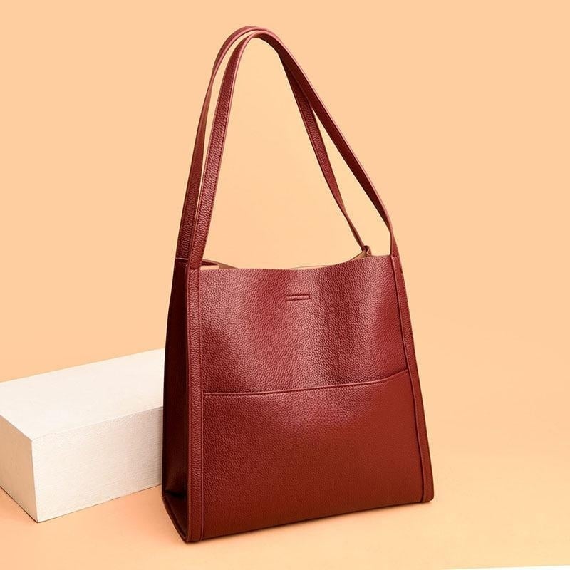 SAC À BANDOULIÈRE EN VÉRITABLE DE COULEUR UNIE