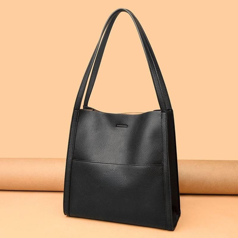 SAC À BANDOULIÈRE EN VÉRITABLE DE COULEUR UNIE