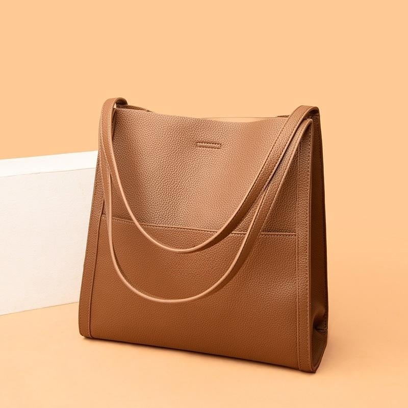 SAC À BANDOULIÈRE EN VÉRITABLE DE COULEUR UNIE