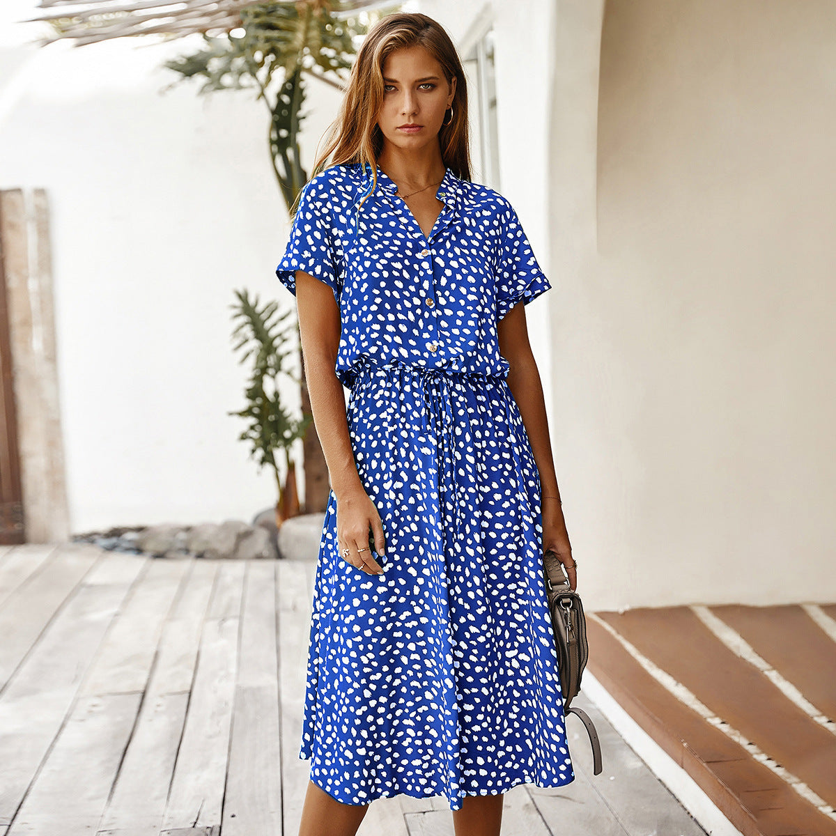 Robe midi femme style décontracté à pois, idéale pour l'été et les sorties