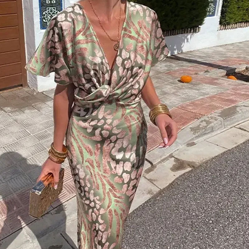 Claire – Robe Élégante à Col en V et Imprimé Torsadé