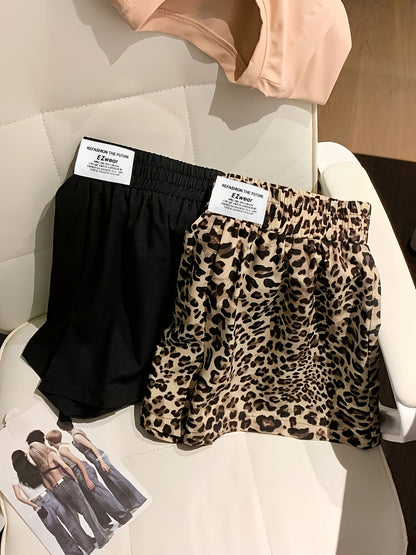 Afslappede dame-shorts med leopardmønster og ensfarvet, perfekte til sommeren