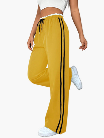 Pantalon large sport femme style streetwear à bandes – coupe décontractée idéale pour le quotidien