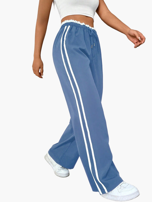 Pantalon large sport femme style streetwear à bandes – coupe décontractée idéale pour le quotidien