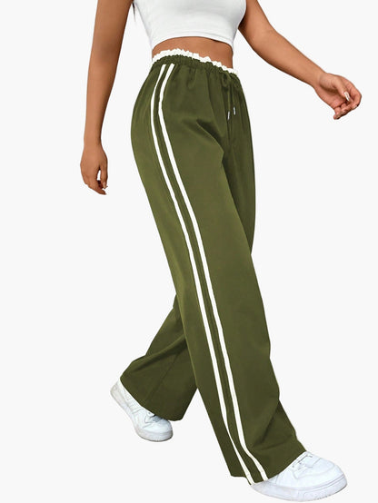 Pantalon large sport femme style streetwear à bandes – coupe décontractée idéale pour le quotidien