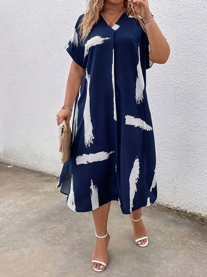 Elegancka tunika damska z artystycznym nadrukiem, styl casual chic