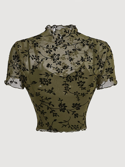 Elegant dame top med blomsterprint, transparent og med høj hals
