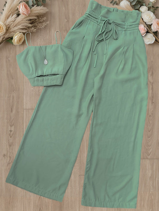 Elegant women's set, cropped camisole top and high-waisted pants, chic and casual style