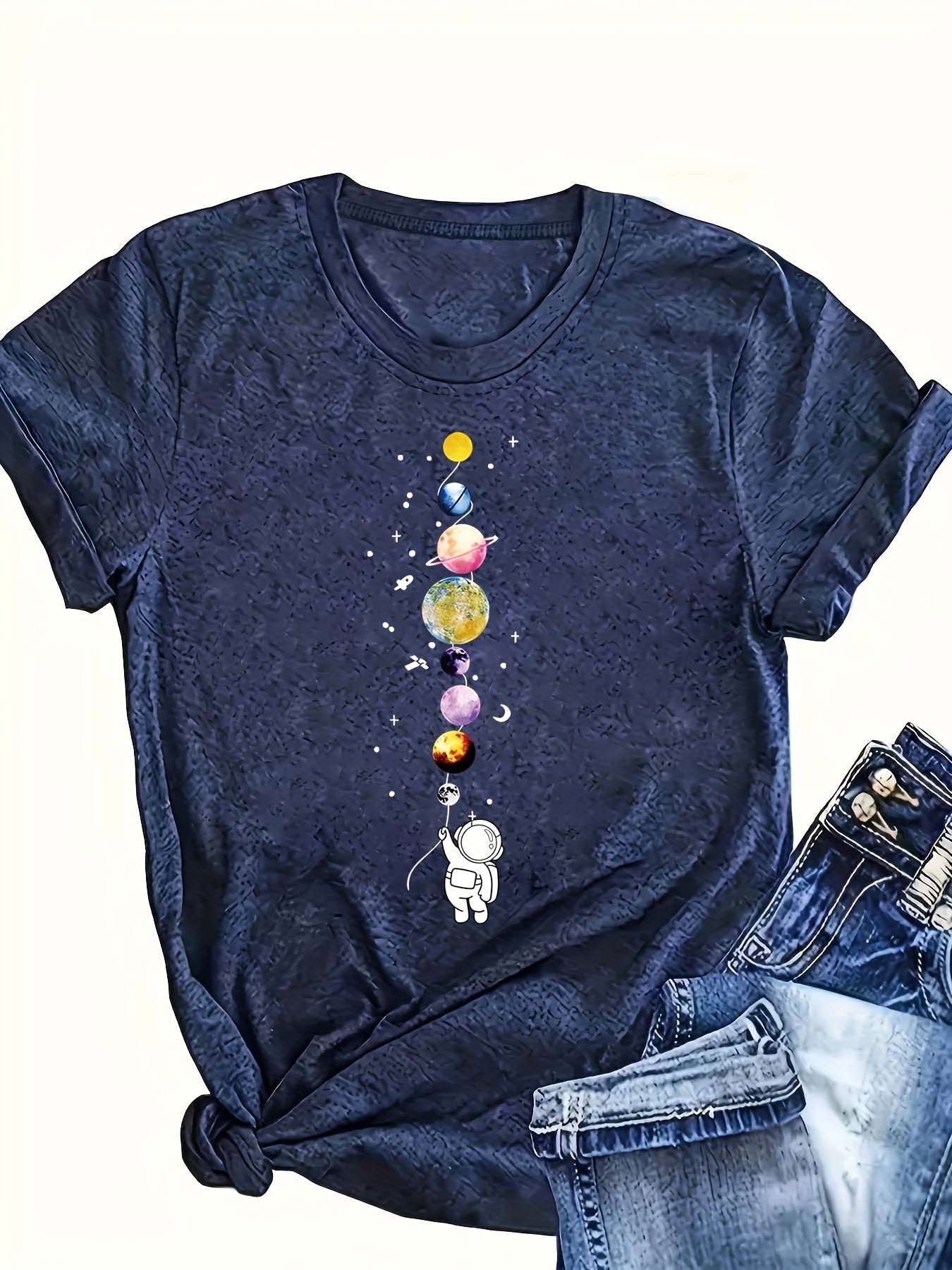 Women's casual style T-shirt with astronaut and planets design, space-inspired, ideal for science enthusiasts and urban fashion fans