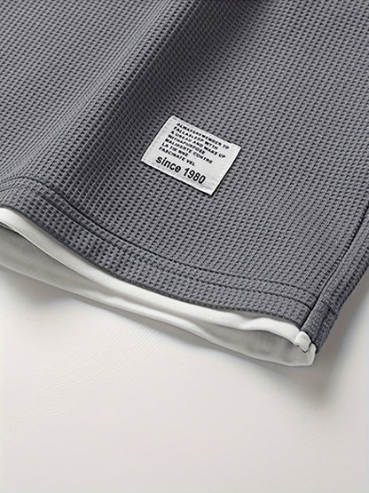 Conjunto informal para hombre de dos piezas camiseta holgada y pantalón corto estilo urbano ideal para descanso y salidas