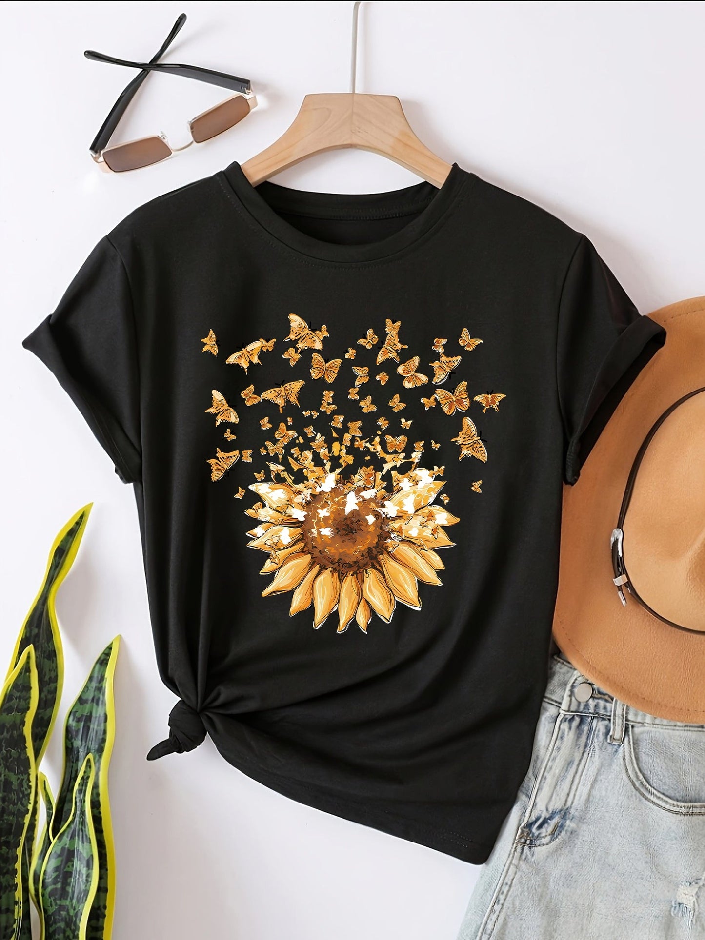 Women's casual style T-shirt with sunflower and butterfly pattern, trendy print for spring-summer