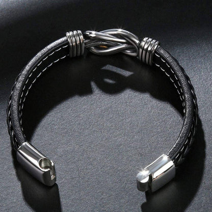 Charlie – Bracelet en cuir tressé pour homme avec nœud infini et fermoir en acier inoxydable