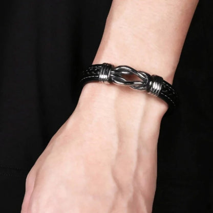 Charlie – Bracelet en cuir tressé pour homme avec nœud infini et fermoir en acier inoxydable