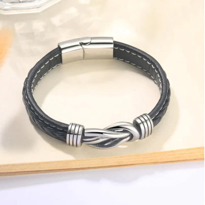 Charlie – Bracelet en cuir tressé pour homme avec nœud infini et fermoir en acier inoxydable