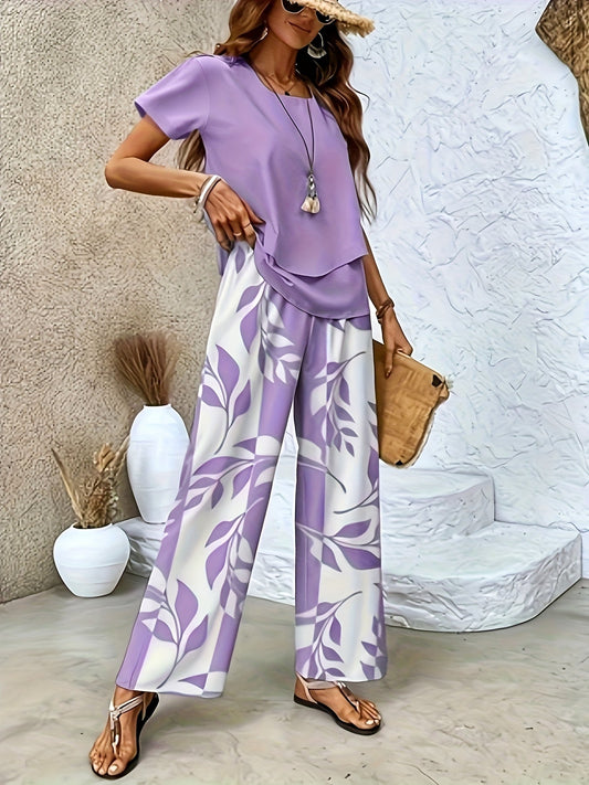 Elegant set för dam med kortärmad, avslappnad chic stil och vida byxor med blommigt mönster