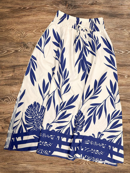 Ensemble féminin style vacances chic à motifs tropicaux - Haut sans manches et jupe longue avec taille froncée