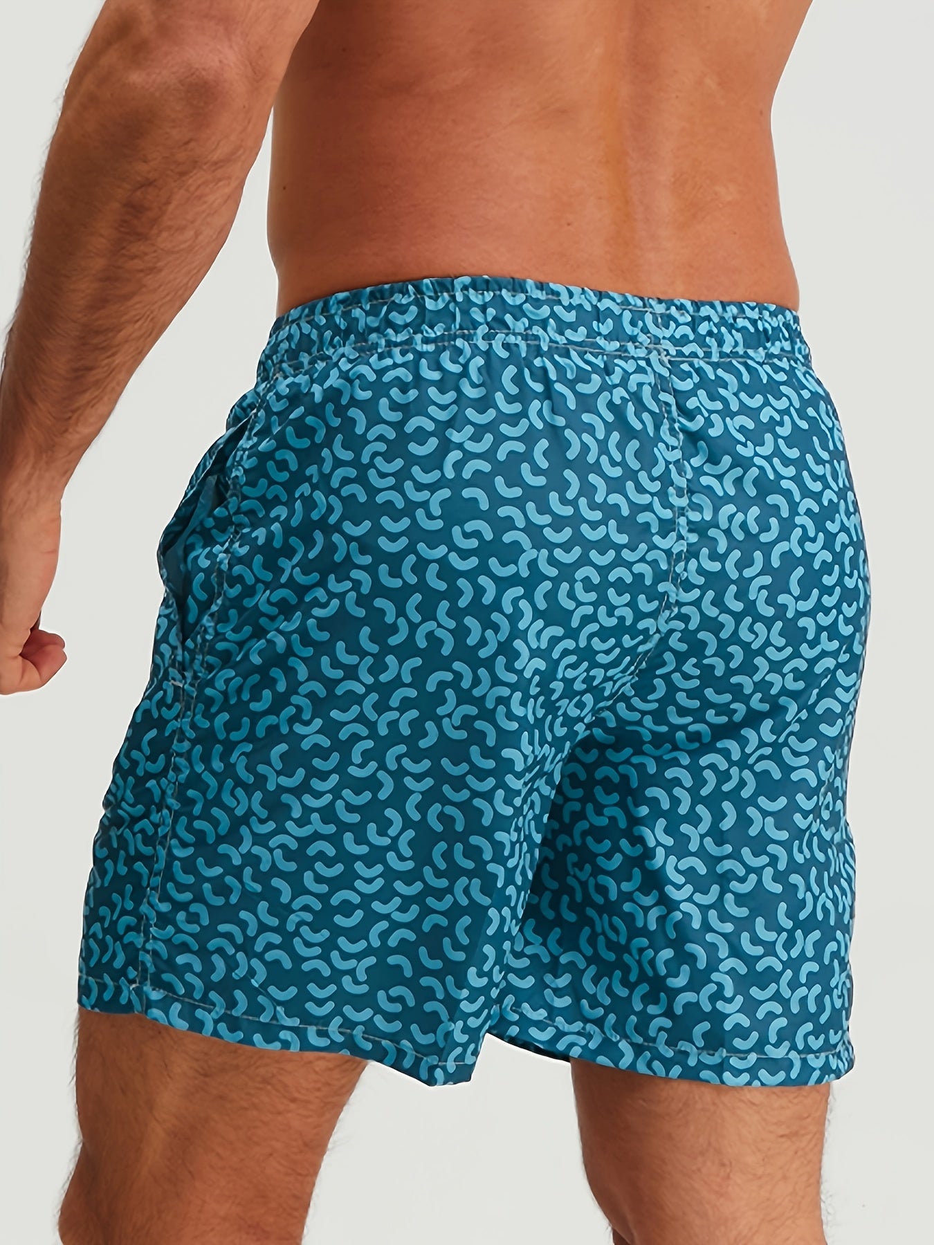Short de bain homme style sportswear motif graphique pour plage et piscine