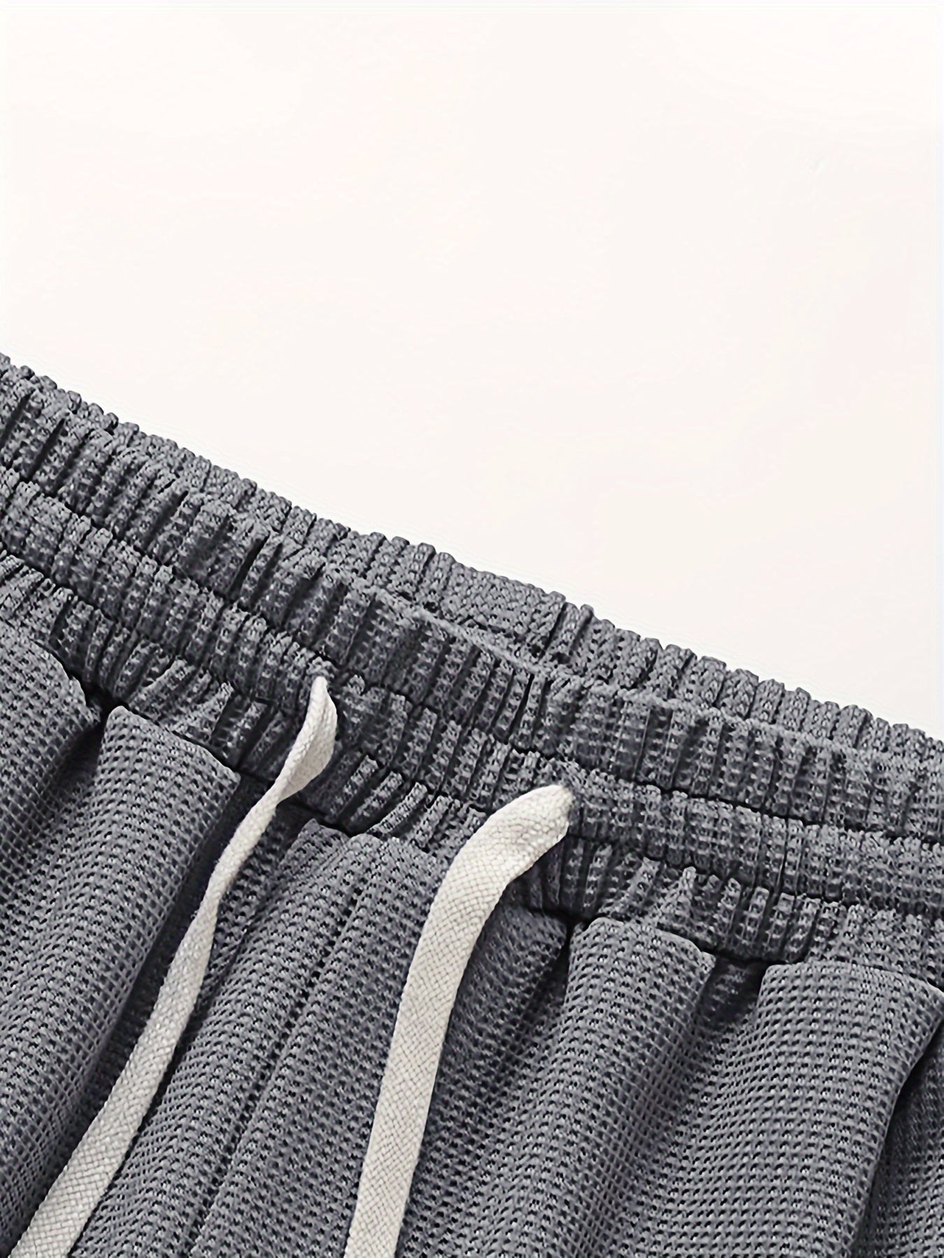 Conjunto informal para hombre de dos piezas camiseta holgada y pantalón corto estilo urbano ideal para descanso y salidas