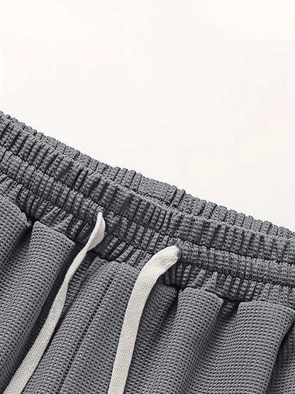 Conjunto informal para hombre de dos piezas camiseta holgada y pantalón corto estilo urbano ideal para descanso y salidas