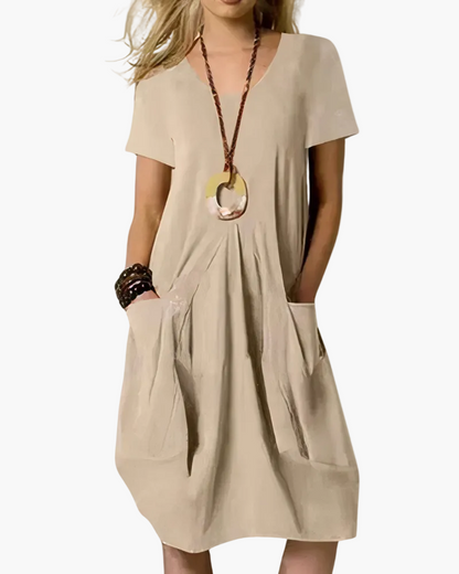 Damska sukienka midi o luźnym kroju w stylu casual chic z kieszeniami – Elegancja na co dzień