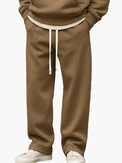 Ensemble décontracté homme style streetwear avec sweat à capuche et pantalon – Tenue idéale pour loisirs et détente