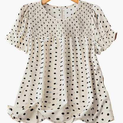 Blusa femminile a pois stile elegante con maniche corte e collo rotondo per l'estate