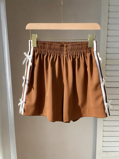 Top corto casual para mujer estilo vacaciones con nudos laterales y bandas deportivas