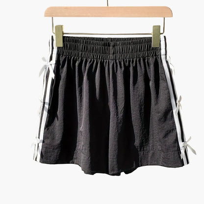 Top corto casual para mujer estilo vacaciones con nudos laterales y bandas deportivas
