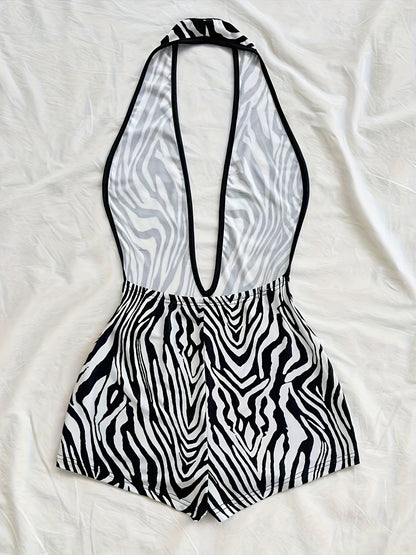 Tuta corta intera donna stile animalier, scollatura profonda, tendenza estate, ideale per spiaggia e vacanze
