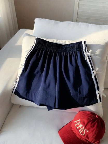 Top corto casual para mujer estilo vacaciones con nudos laterales y bandas deportivas