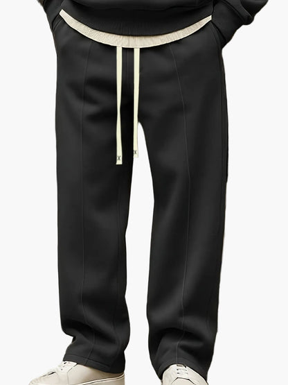 Ensemble décontracté homme style streetwear avec sweat à capuche et pantalon – Tenue idéale pour loisirs et détente