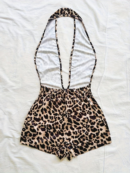 Tuta corta intera donna stile animalier, scollatura profonda, tendenza estate, ideale per spiaggia e vacanze