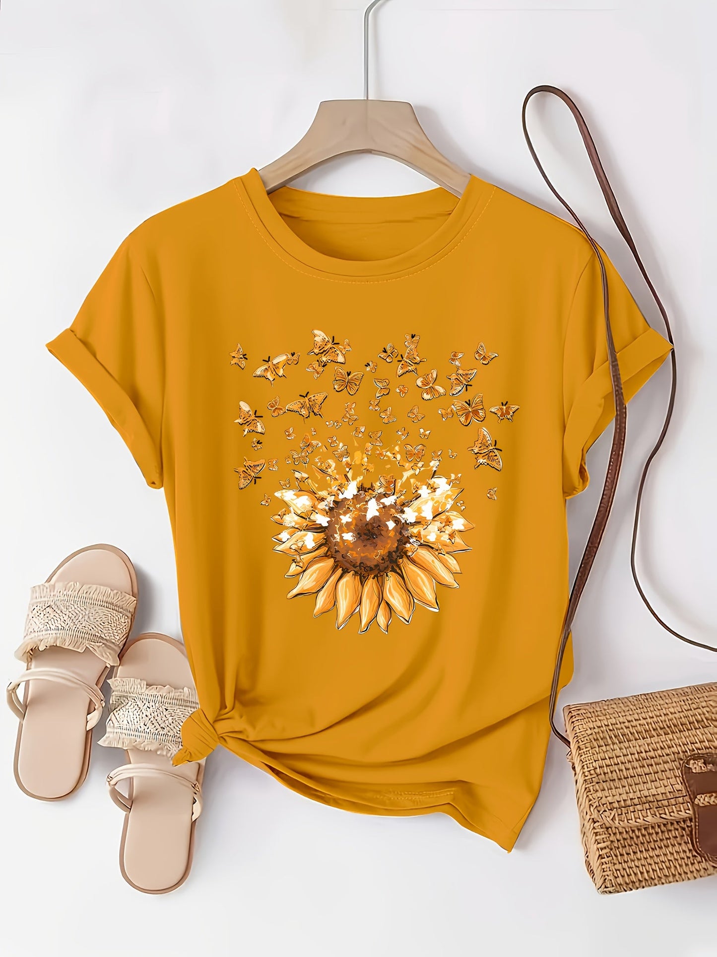 Women's casual style T-shirt with sunflower and butterfly pattern, trendy print for spring-summer