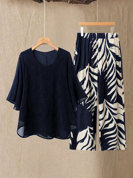 Elegant Casual Women's Two-Piece Set – Flowing Top and Leaf Print Pants, Chic Vacation Style