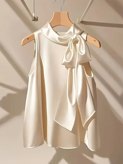Blouse sans manches femme style élégant avec col lavallière et coupe ample pour sorties ou occasions spéciales