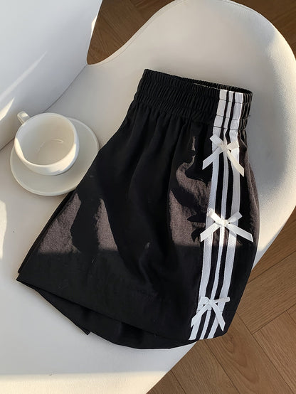 Top corto casual para mujer estilo vacaciones con nudos laterales y bandas deportivas