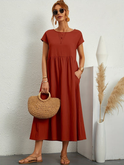 Élégante Robe Midi avec Poche à la Taille et Encolure Ronde