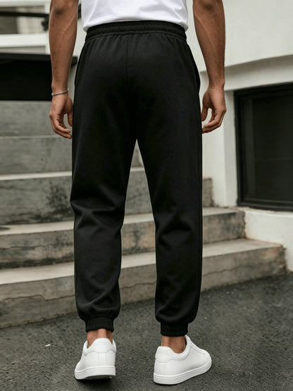 Pantaloni da jogging uomo taglio dritto stile urbano per sport e relax