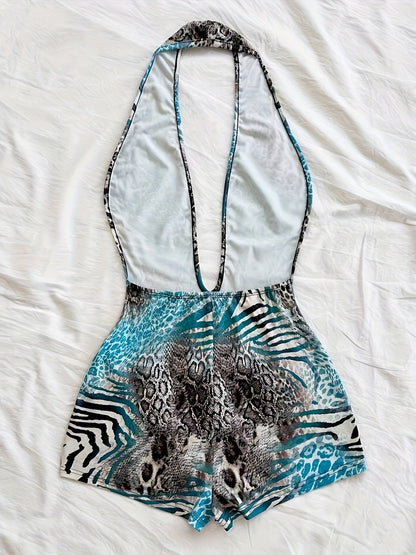 Tuta corta intera donna stile animalier, scollatura profonda, tendenza estate, ideale per spiaggia e vacanze