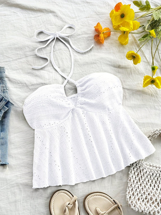 Haut dos nu féminin style babydoll brodé pour look estival romantique