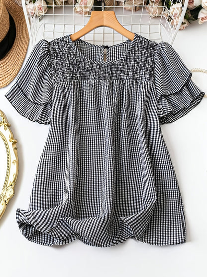 Blusa femminile a pois stile elegante con maniche corte e collo rotondo per l'estate