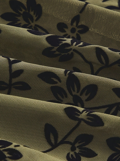 Elegant dame top med blomsterprint, transparent og med høj hals