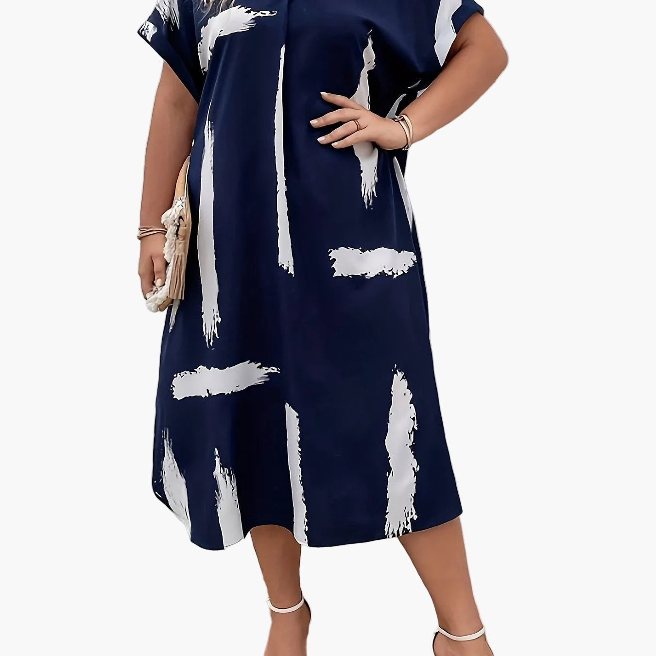 Elegancka tunika damska z artystycznym nadrukiem, styl casual chic