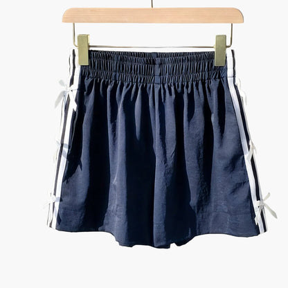 Top corto casual para mujer estilo vacaciones con nudos laterales y bandas deportivas