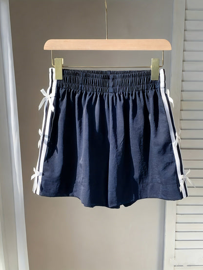 Top corto casual para mujer estilo vacaciones con nudos laterales y bandas deportivas
