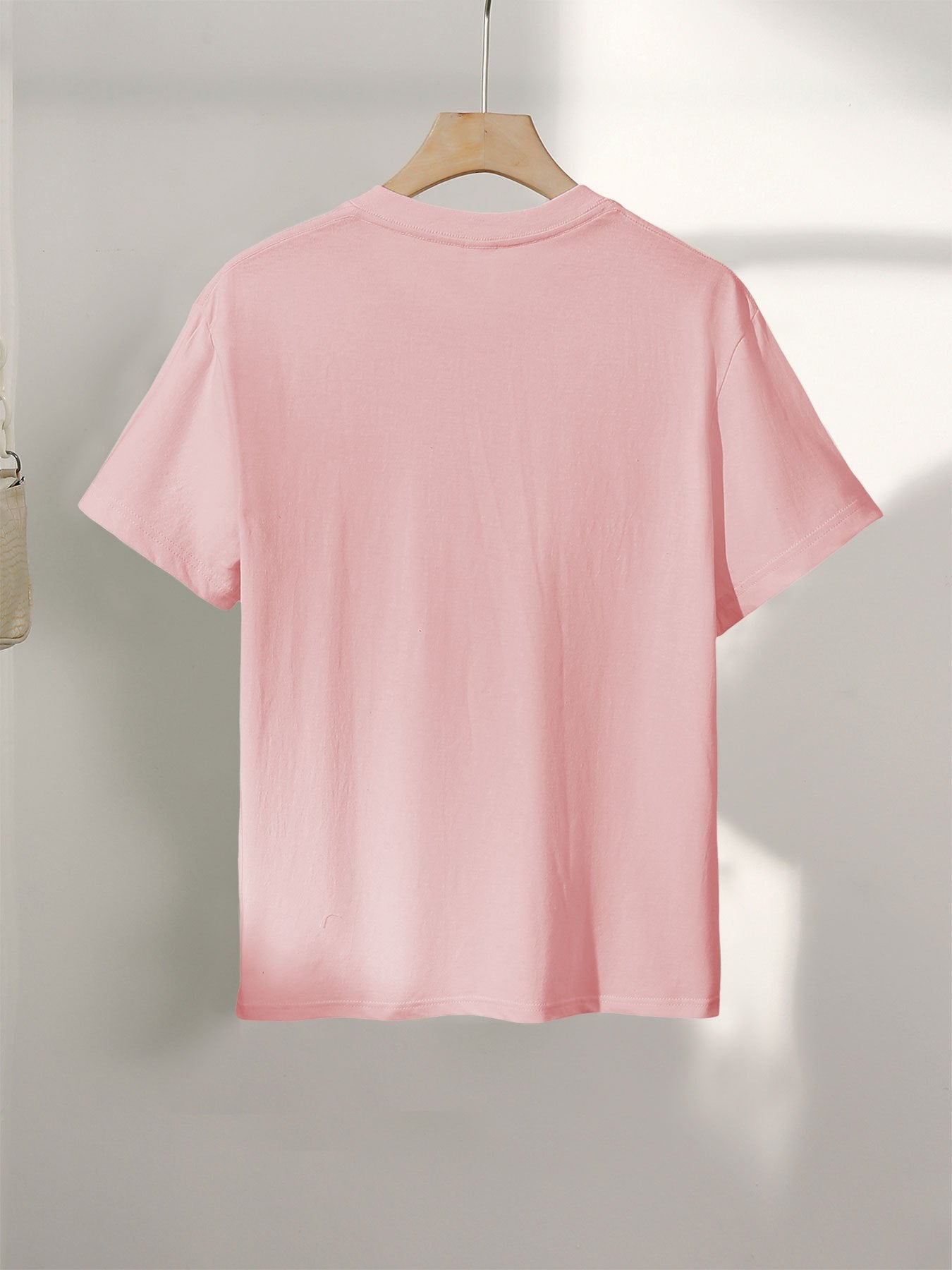 Afslappet dame-T-shirt med vintage bådmotiv i nautisk stil til urban eventyr