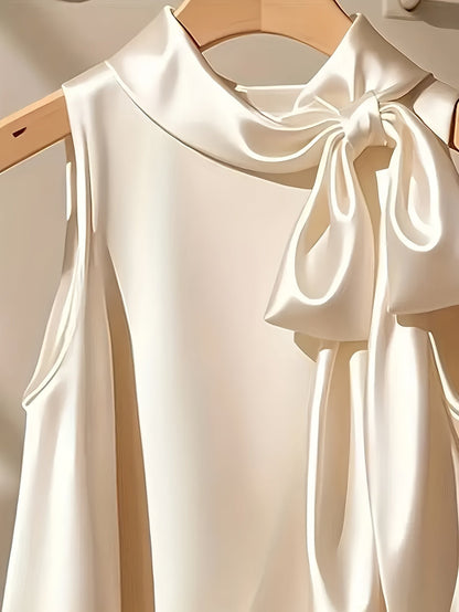 Blouse sans manches femme style élégant avec col lavallière et coupe ample pour sorties ou occasions spéciales