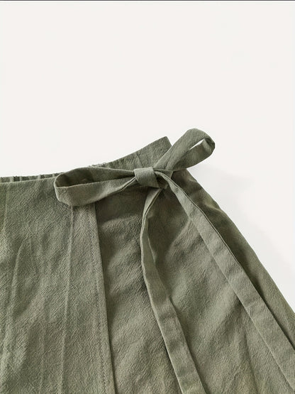Jupe portefeuille courte style urbain pour femme, look décontracté chic, idéale pour l'été