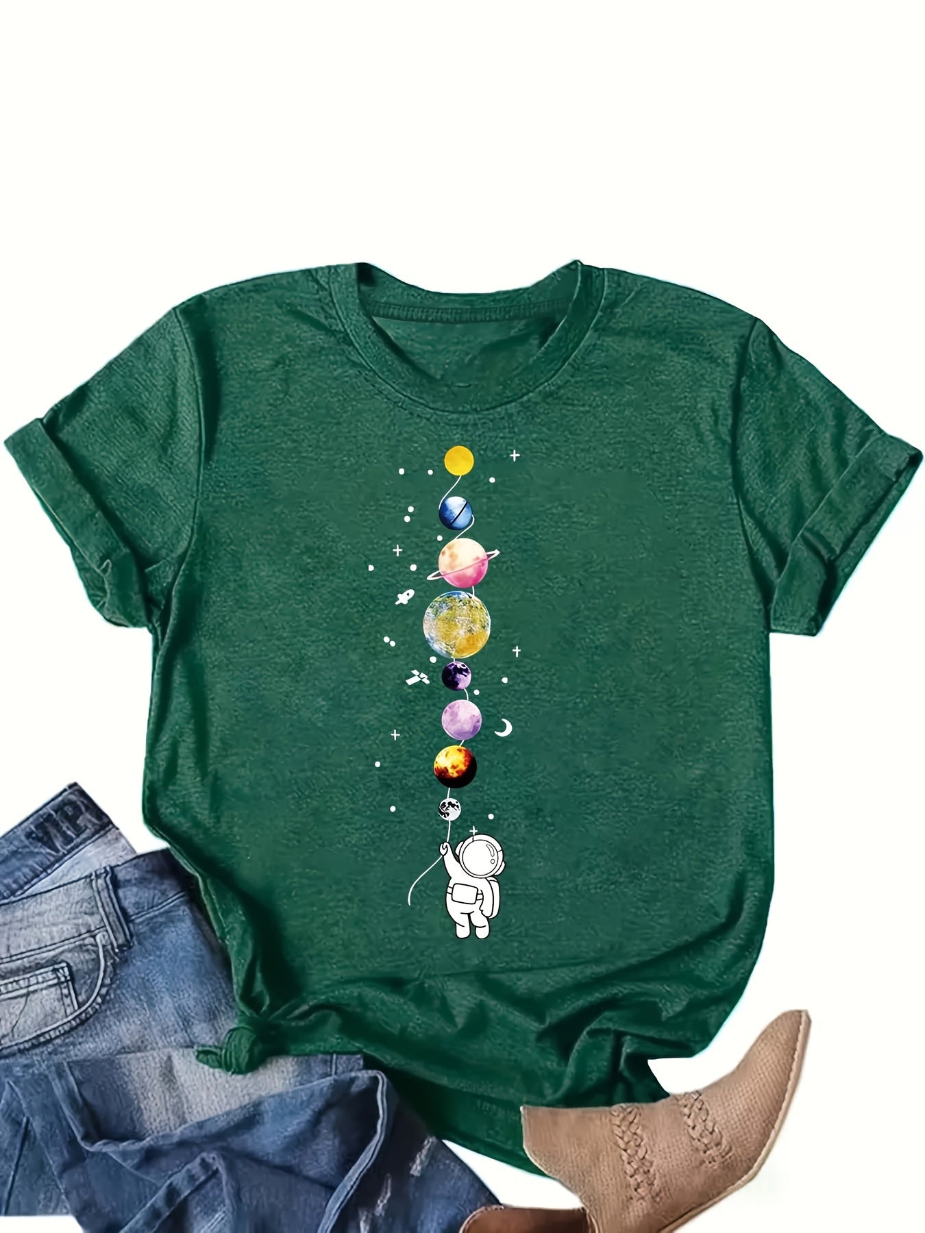 Women's casual style T-shirt with astronaut and planets design, space-inspired, ideal for science enthusiasts and urban fashion fans