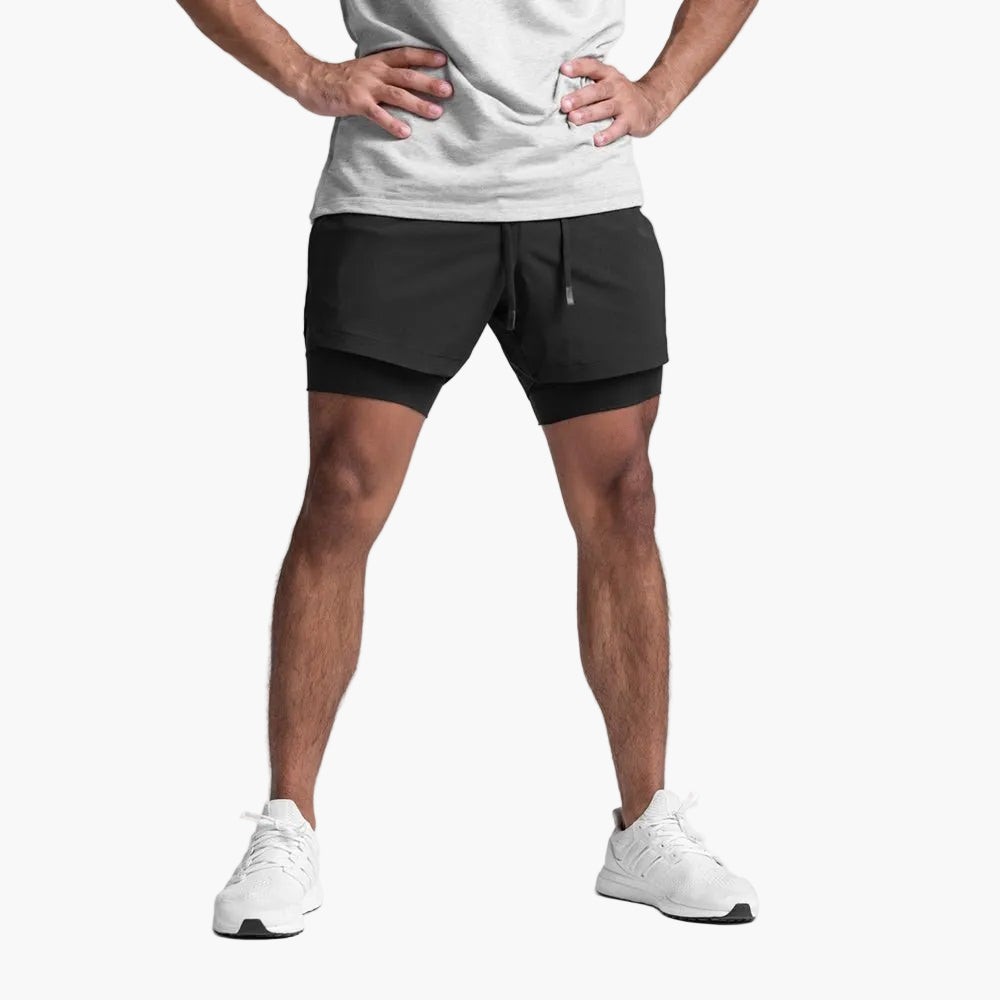 Korte sportbroek voor heren fitness prestatie stijl modern